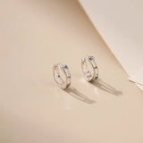 Crossed Circle Silver Hoops