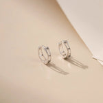 Crossed Circle Silver Hoops