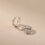 Crossed Circle Silver Hoops